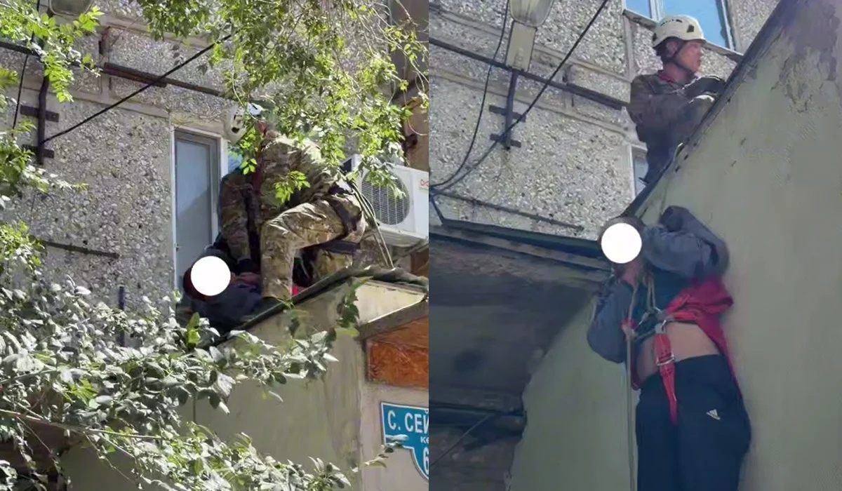 Мужчина оказался на козырьке подъезда в Улытау: спасатели его эвакуировали