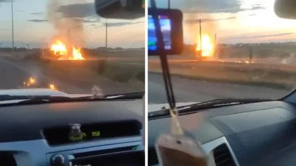 Движущийся трактор с горящими прицепами сняли на трассе в ЗКО