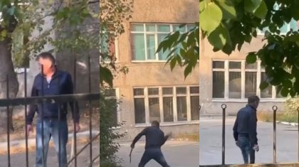 «Живодер!»: мужчина гонял собак палкой во дворе дома в Алматы (ВИДЕО)