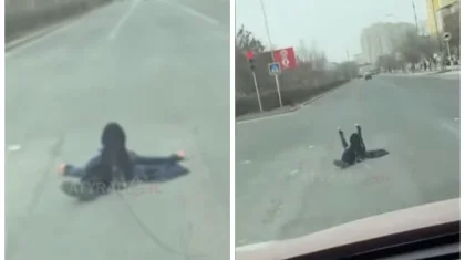 Женщина улеглась на перекрестке в центре Атырау (ВИДЕО)