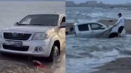 Пикап застрял в море в Актау: на его фоне сделали предложение (ВИДЕО)