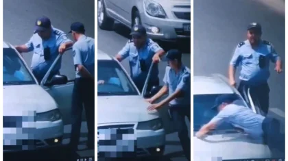 Водитель прокатил полицейского на капоте авто и попал на видео в Шымкенте