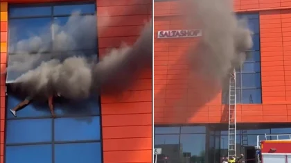 Мужчина повис на окне во время пожара в ТРЦ в Шымкенте (ВИДЕО)