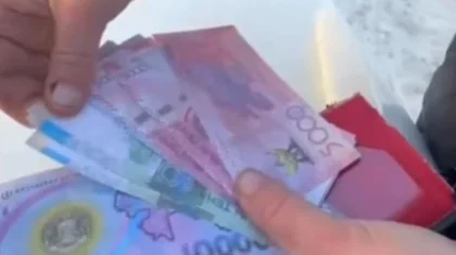 На рынке Актобе женщина расплачивалась поддельными купюрами (ВИДЕО)