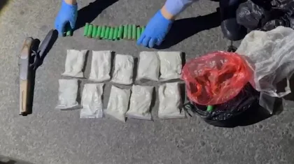 Обрез с патронами и наркотики на 25 млн тенге обнаружили в автомобиле в Алматы